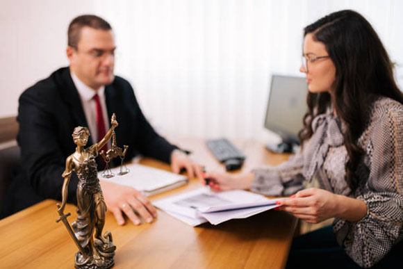 A client and lawyer discussing appraisals